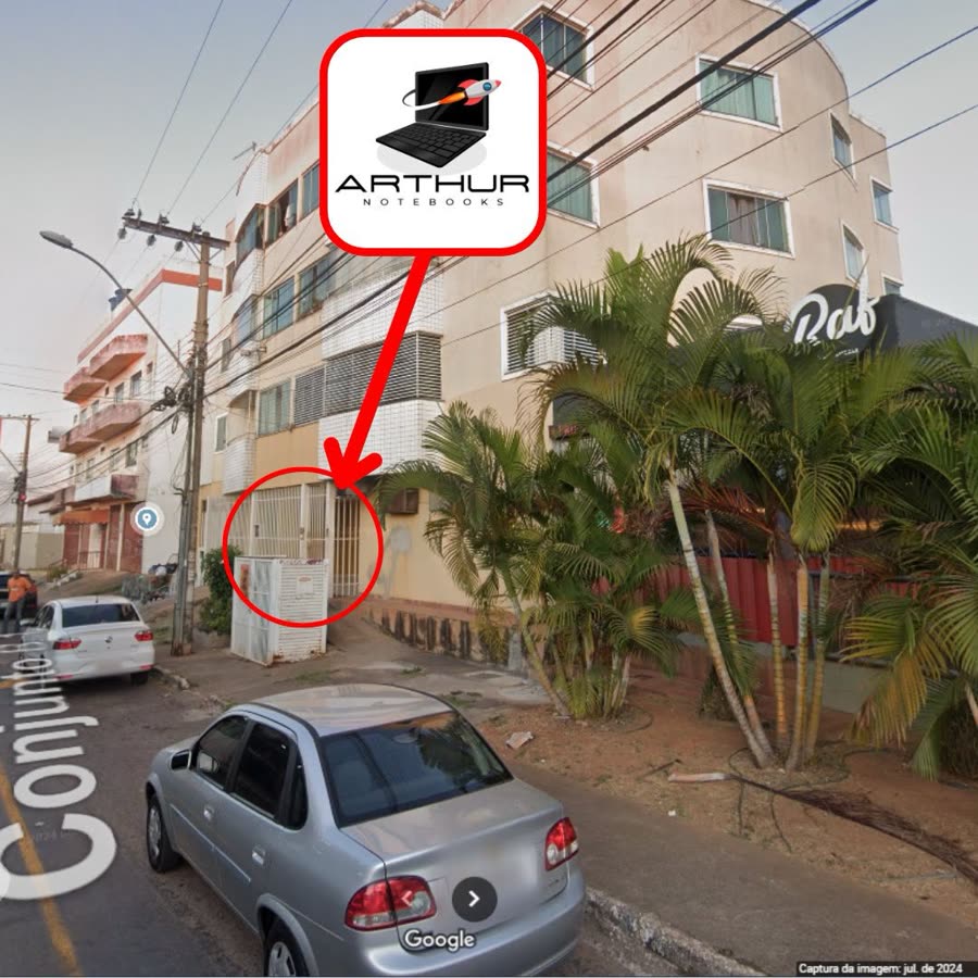 Prédio da Arthur Notebooks na QS 412 Conjunto B, Samambaia Norte, com a hamburgueria RAF na esquina e seta indicando o portão de entrada